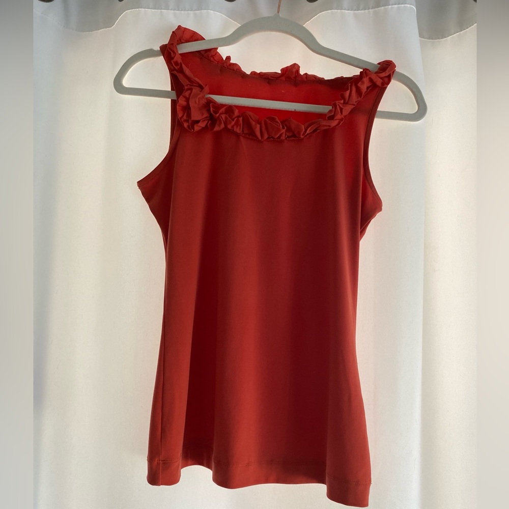 Orange sleeveless blouse
